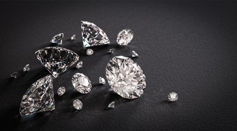 Beautiful shiny diamonds on black background