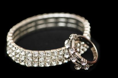 Diamond bracelet and ring isolated  on black